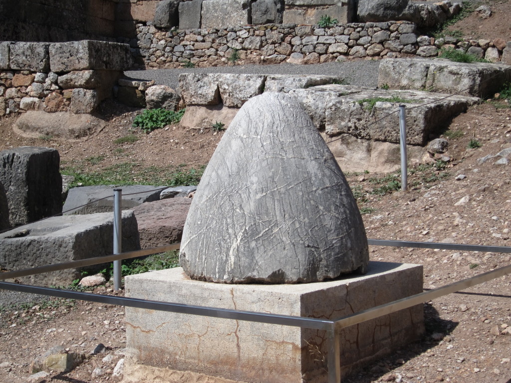 Ancient stone carving depicting the belief that Mt. Parnassus was the "naval of the world".