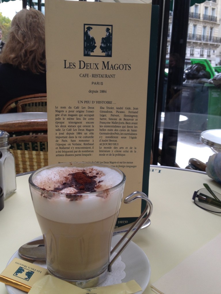 Sitting outside for breakfast at Les Deux Magots. they serve chocolate with everything!