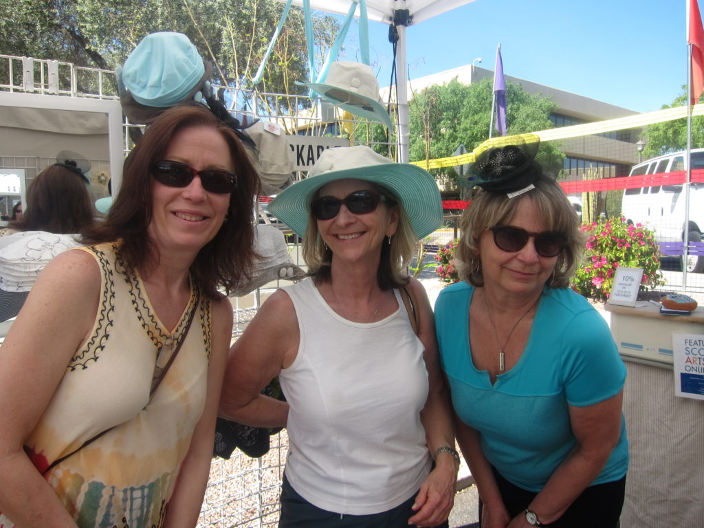 Fun hats, fun ladies, fun times at the Arts Festival