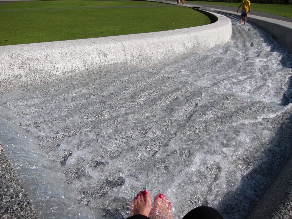 Refreshing my sore feet in the rushing water of the Princess Di memorial. So soothing and refreshing!